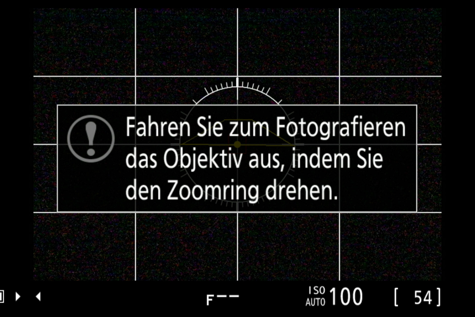 Warnhinweis bei eingefahrenem Objektivtubus.