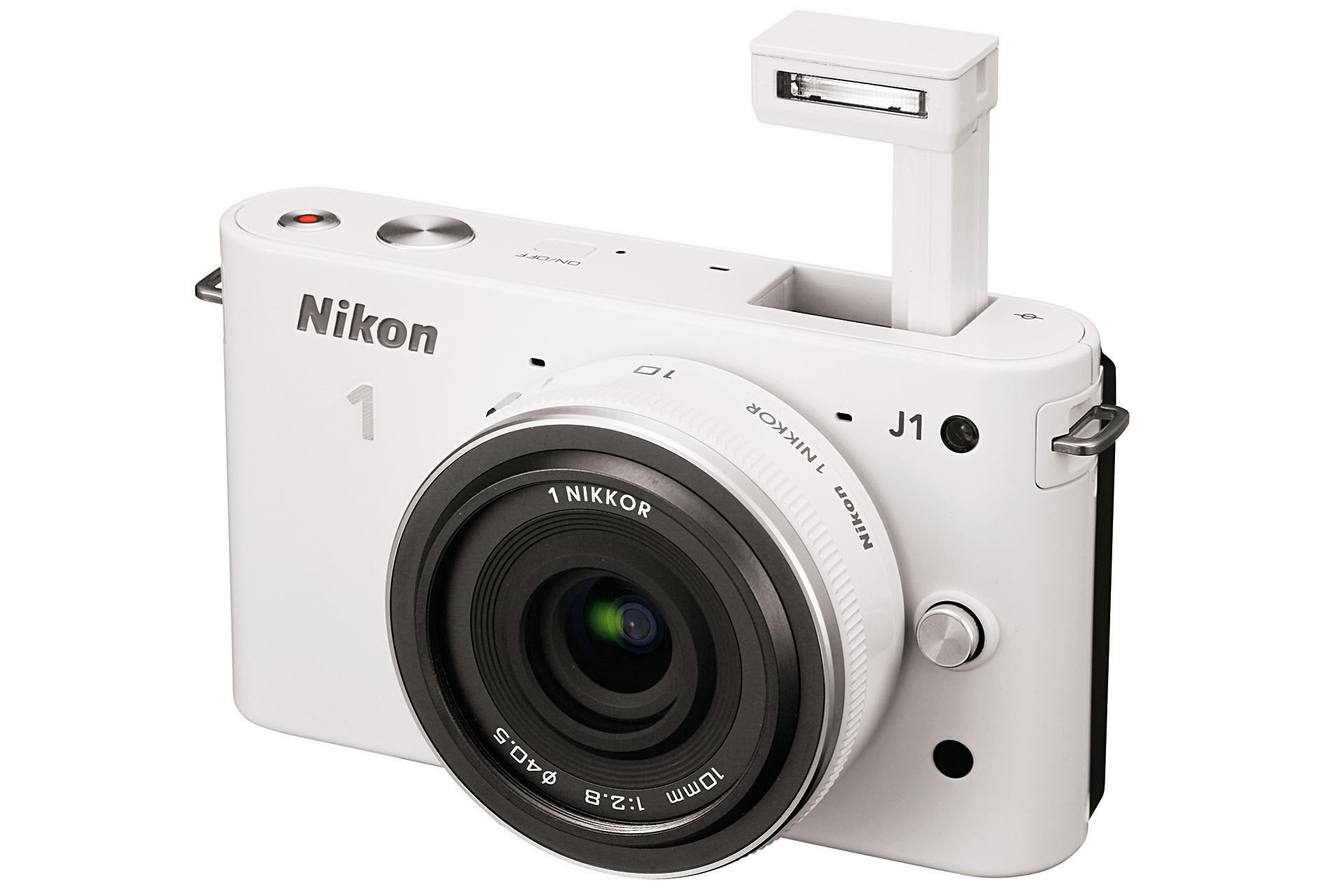 Die Nikon 1 J1 ist die kleinere der beiden spiegellosen 
Systemkameras von Nikon. Gegenüber ihrer grösseren 
Schwester besitzt sie einen ausklappbaren Blitz und ist den 
fünf Farben Weiss, Schwarz, Silber, Pink und Rot erhältlich.