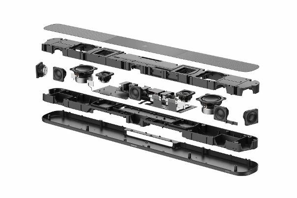 Über neun Lautsprecher bildet die Ambeo Dolby-Atmos-Filmsound mit bis zu 7.1.4 Kanälen ab. Wie man auf dieser Explosionszeichnung gut erkennt, verbirgt sich bei der Soundbar einiges unter der Haube.